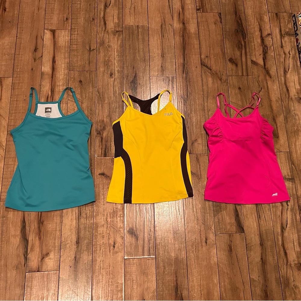 ALL three workout shirts, The North Face, Avia & FILA. Size Medium